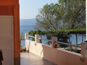 One bedroom apartment near beach Duće, Omiš (A-5275-b) - Dugi Rat - image1