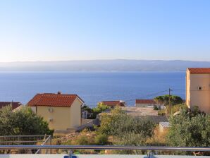 Apartment Two bedroom apartment with terrace and sea view Mali Rat, Omiš (A-9698-a)