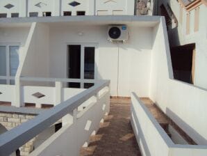 Two bedroom apartment with terrace and sea view Metajna, Pag (A-12443-a) - Metajna - image1