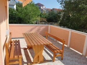 Two bedroom apartment with terrace Lopar, Rab (A-16680-b) - Lopar - image1