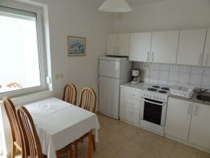 Two bedroom apartment with terrace and sea view Rab (A-16359-a) - Banjol - image1