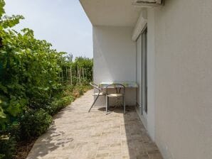 Two bedroom apartment near beach Pisak, Omiš (A-15177-a) - Pisak - image1