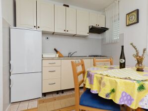 Two bedroom apartment near beach Pisak, Omiš (A-15177-a) - Pisak - image1