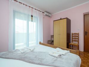 Two bedroom apartment with balcony and sea view Zubovići, Pag (A-16063-a) - Zubovići - image1