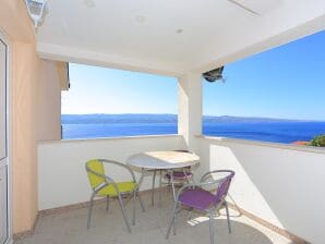 One bedroom apartment with terrace and sea view Stanići, Omiš (A-17894-d) - Stanici - image1