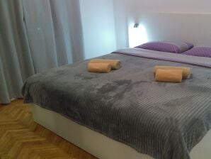 Two bedroom apartment with air-conditioning Starigrad, Paklenica (A-17340-a) - Starigrad - image1
