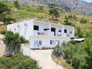 One bedroom apartment with balcony and sea view Lokva Rogoznica, Omiš (A-17645-b) - Ruskamen - image1