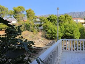 Two bedroom apartment with terrace and sea view Mali Rat, Omiš (A-18485-a) - Dugi Rat - image1