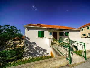 Three bedroom apartment with terrace and sea view Postira, Brač (A-18472-a) - Postira - image1