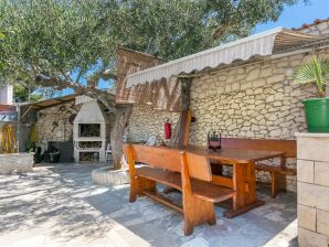 Two bedroom apartment with terrace Supetar, Brač (A-5670-c) - Supetar - image1