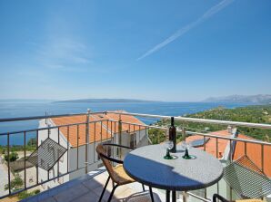 Two bedroom apartment with balcony and sea view Krvavica, Makarska (A-18911-c) - Krvavica - image1