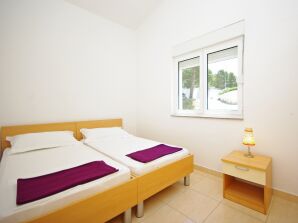Three bedroom apartment with balcony and sea view Krvavica, Makarska (A-18911-d) - Krvavica - image1