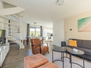 Living room with open kitchen with lovely daylight