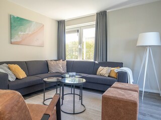 Living room with open kitchen with lovely daylight