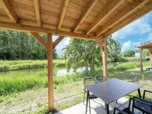 Holiday house Neues Ferienhaus mit Sauna am Wasser - Simonshaven - image1