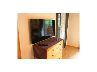 Zimmer mit Seeblick im Sommer