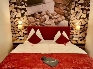 Schlafzimmer Holzofen