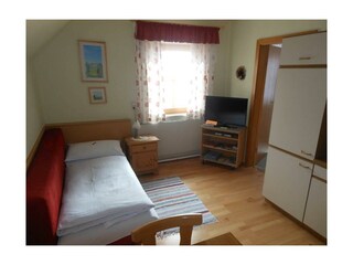 bequeme Schlafcouch in der Wohnküche