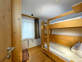 Schlafzimmer im Appartement Zwergerl