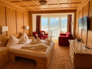 Doppelzimmer Superior Enzian Teppich braun quer