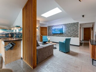 ALM1livingkitchen©AlmAppartementsZellamsee