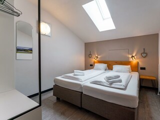 ALM2bedroom1©AlmAppartementsZellamsee