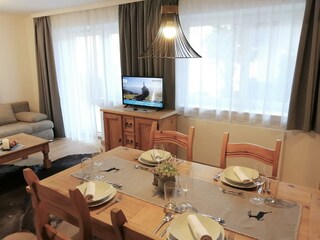 Ferienwohnung Balkon Seeblick - Wohnzim/Essbereich