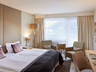 DAS ALPENHAUS KAPRUN Beipielzimmer