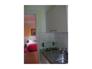 Küchenzeile und Schlafzimmer