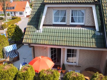 Holiday in Grömitz: Hübsches 3 Zimmer Ferienhaus mit Strandkorb in 1. Reihe