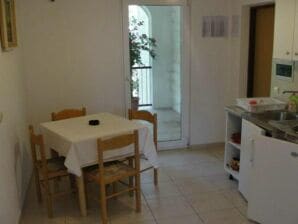 Apartments Boguvila - Two-Bedroom Economy Apartment with Terrace (A5) - (ST) - Supetar - image1