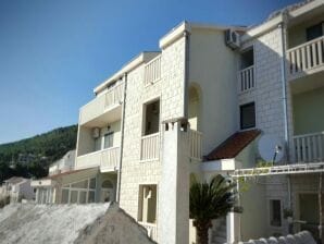 Apartments Villa Angela - One Bedroom Apartment with Terrace and Sea View (Erika) - Baška Voda - image1