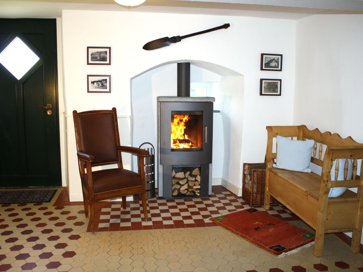 Wood-burning stove in the hall