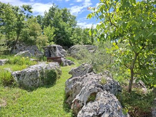 Stone rocks in the garden behind the house