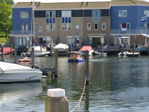 Vakantiehuis Waterwoning met eigen aanlegsteiger - Kortgene - image1