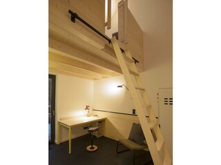 Zweiter Schlafbereich Empore und Arbeitsplatz