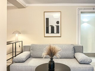 Wohnzimmer mit Schlafsofa