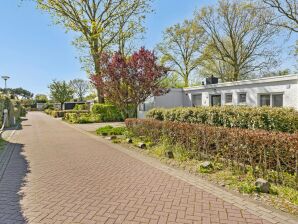 Holiday house Pleasant holiday home with garden - Groot Valkenisse - image1