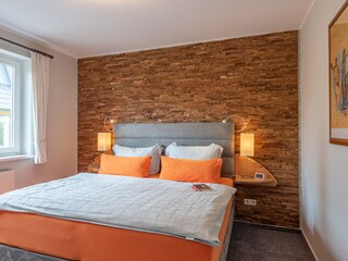 Ferienhaus Lütten Kulli - Schlafzimmer Wohnung 2