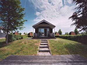 Vakantiepark Mooie woning met veranda en steiger - Bant - image1