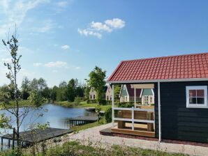 Vakantiepark Chalets met een badkamer, nabij een vijver - Bant - image1