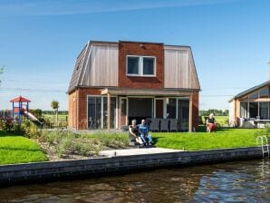 Holiday park Holiday home with jetty near Sneekermeer - Akkrum - image1