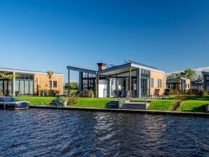 Holiday park Beautiful chalet with a jetty, near Frisian lakes - Akkrum - image1