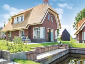 Sfeervolle villa aan het water, op vakantiepark - Idskenhuizen - image1