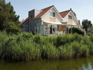 Parc de vacances Maison de vacances au bord de l'eau en Frise - Makkoum - image1