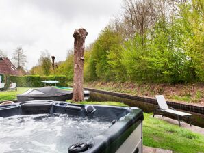 Ferienhaus am Wasser mit Sauna, Spa und Schaluppe - Eernewoude - image1