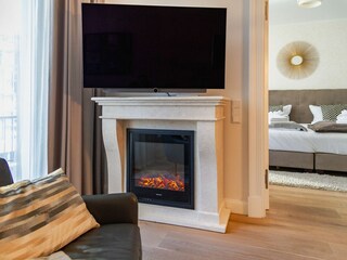 Wohnzimmer mit Elektrokamin