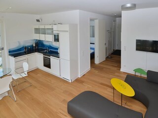 Wohnzimmer mit Küche