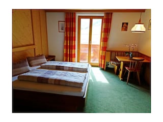 Schlafzimmer Ferienwohnung Bergblick