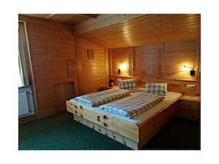 Schlafzimmer Ferienwohnung Bergblick